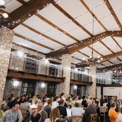 People sitting at the tables in a banquet hall