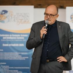 Person talking to a microphone