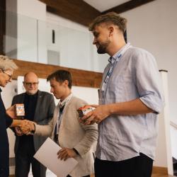 People talking in a banquet hall