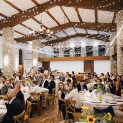 People sitting at the tables in a banquet hall