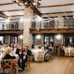 People sitting at the tables in a banquet hall