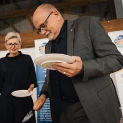 People holding plates